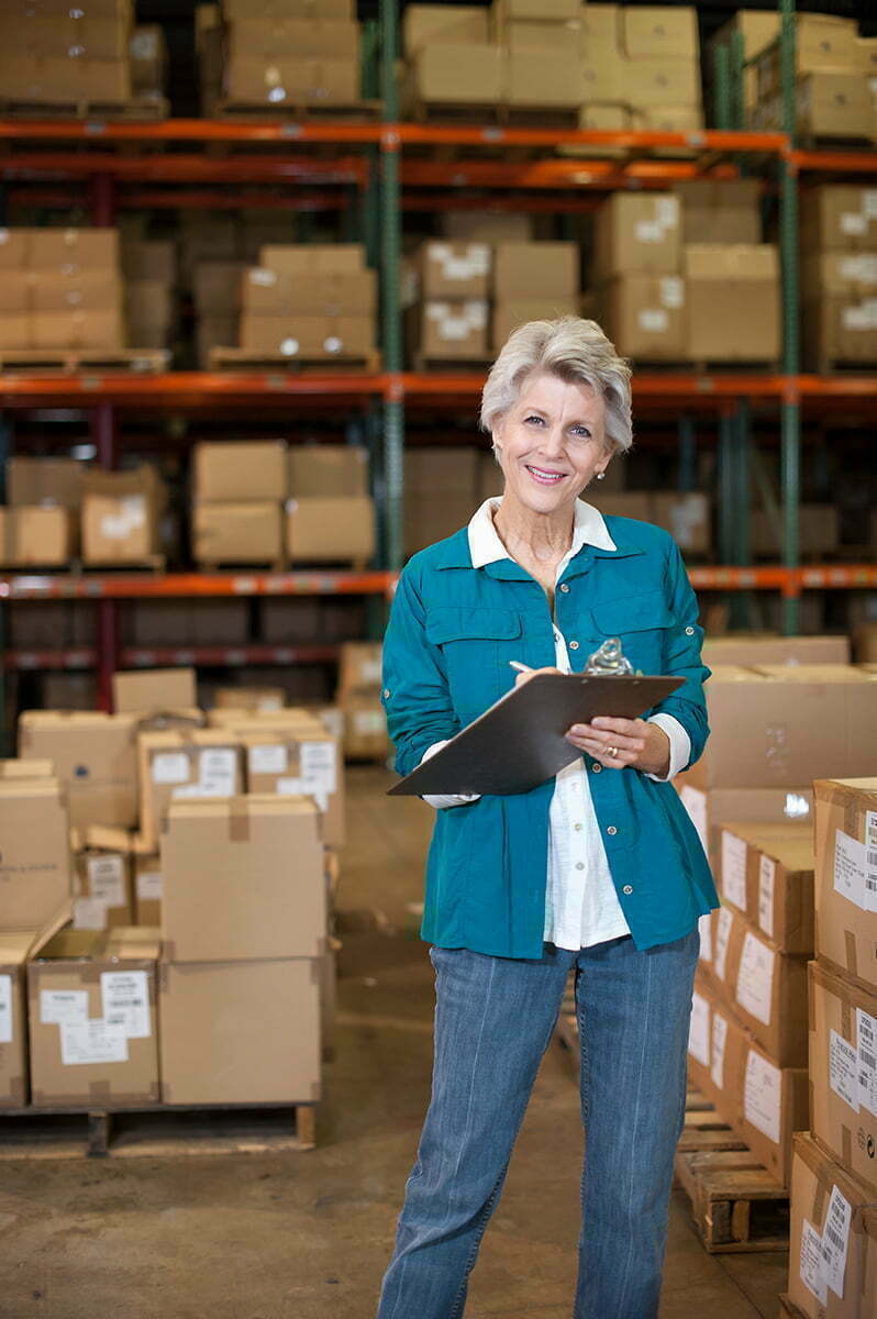 A Modern-looking Woman Ensuring the Activities in the Logistics Field Are Performed in Compliance with the Procedures