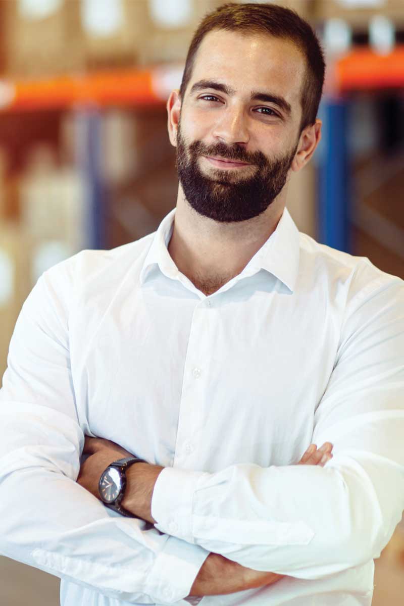 Logistics Operations Responsible Male Employee Who Carries out the Company's Transportation Processes in Compliance with the Procedures and Efficiently